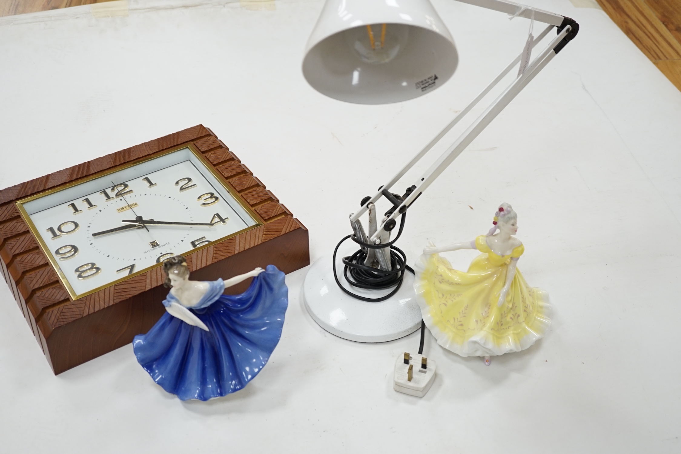 An Art Deco style wall timepiece, an anglepoise lamp and two Doulton figurines